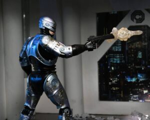 RoboCop Figura Ultimate Battle Damaged RoboCop with Chair