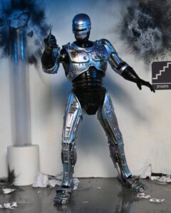 RoboCop Figura Ultimate Battle Damaged RoboCop with Chair