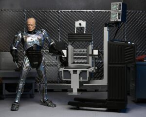 RoboCop Figura Ultimate Battle Damaged RoboCop with Chair